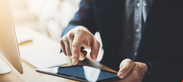 Man working on his tablet