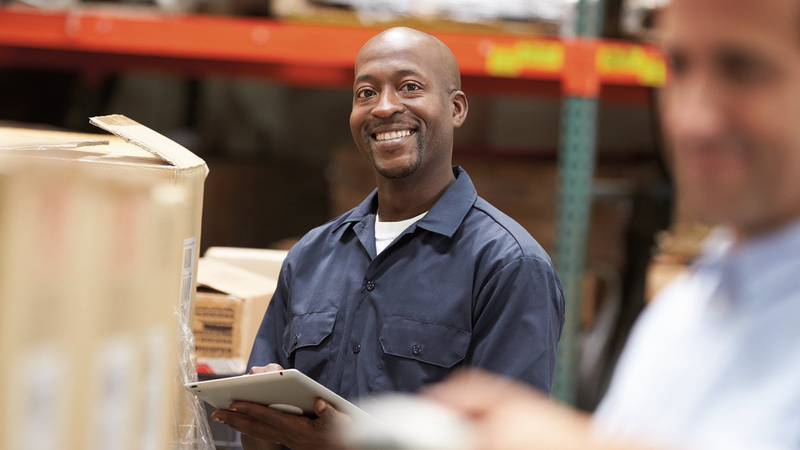 Delivery man smiling